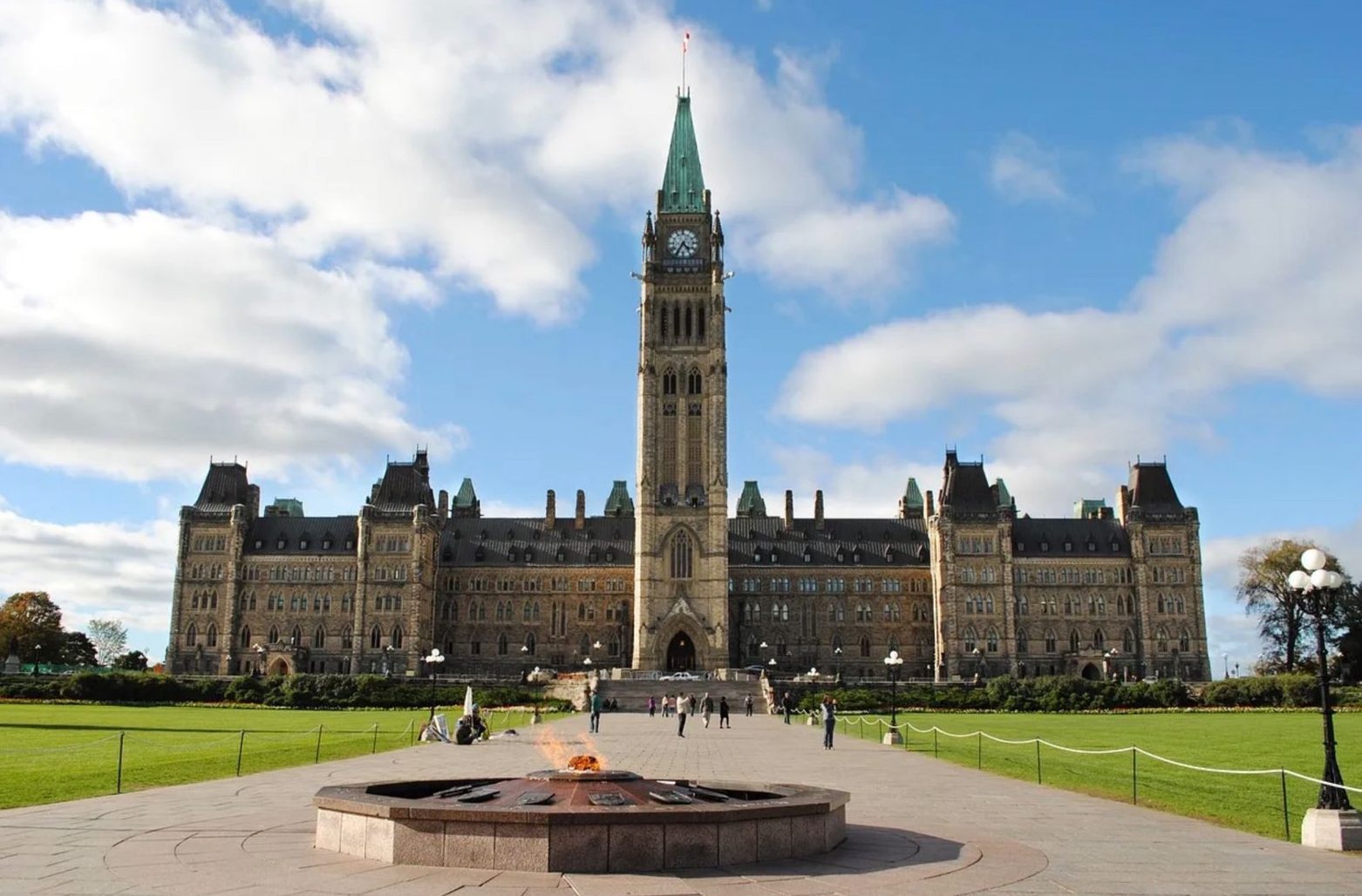 Centre Block and the Peace Tower on Parliament Hill, Ottawa, with the Centennial Flame